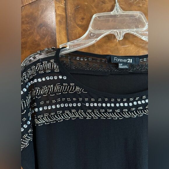 Black sheer top with silver adorned accents - Picture 3 of 6